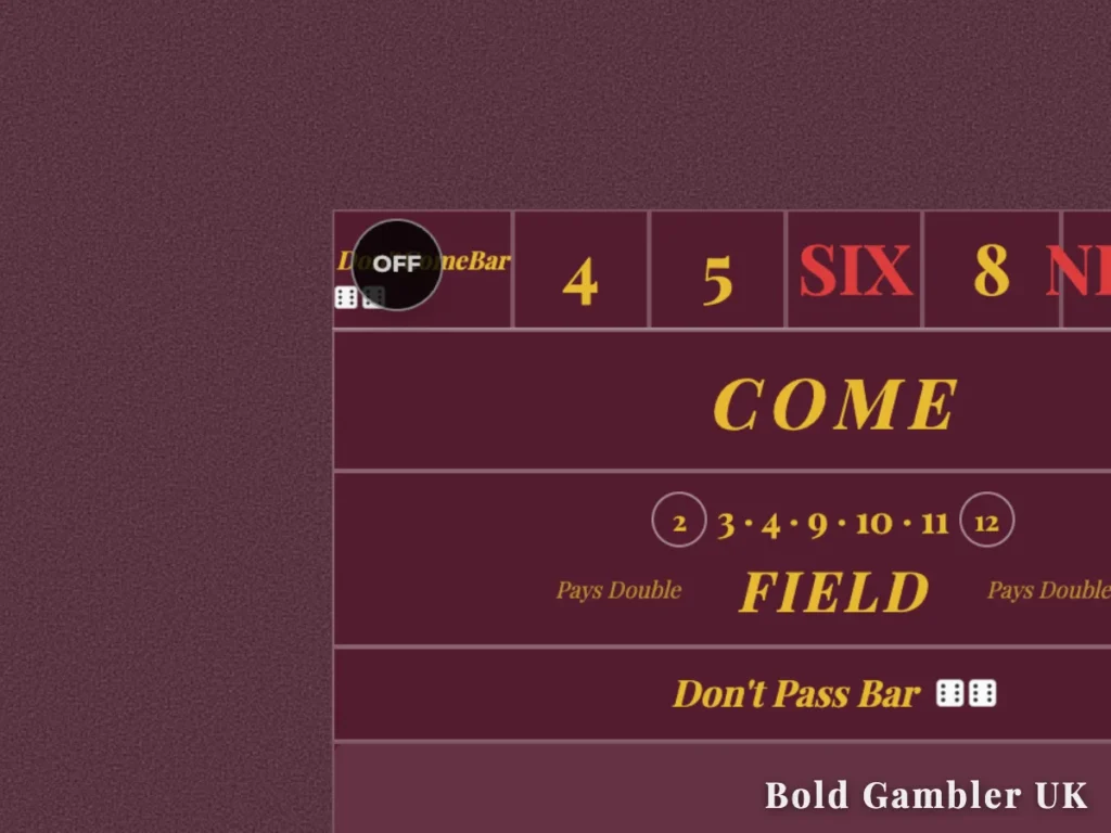 Close-up of a maroon craps table layout with the black plastic puck showing the OFF side before a point is established.